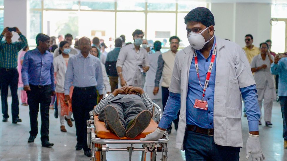 Health department officials and doctors participate in a mock drill amid concerns over the spread of the Covid-19 in Allahabad, India