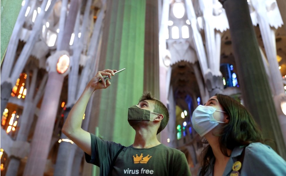 Visitors to the Sagrada Familia basilica in Barcelona, Spain