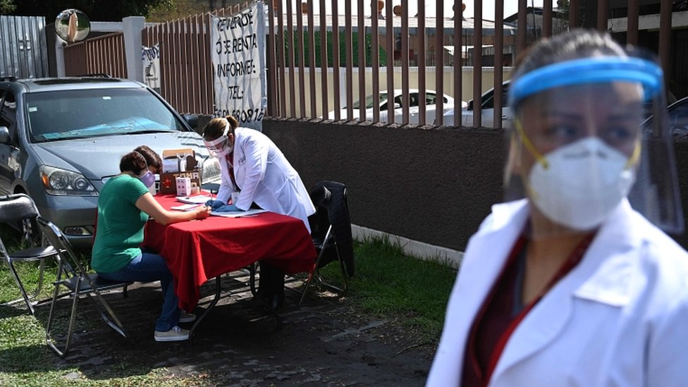A woman fills out a form to donate blood in Mexico City on 30 June 2020