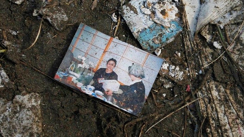 A pciture of a woman found among the debris of the 2011 tsunami in Japan