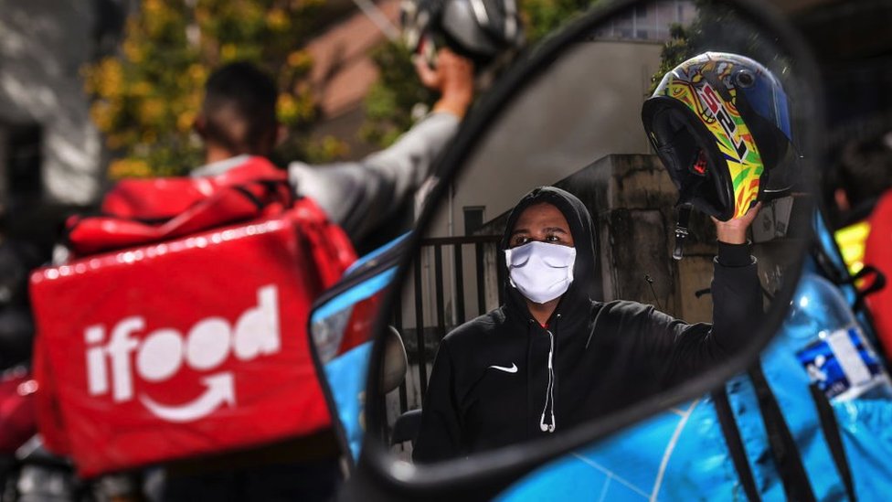 A delivery app worker takes part in a protest to demand better working conditions on July 1, 2020 in Belo Horizonte, Brazil.