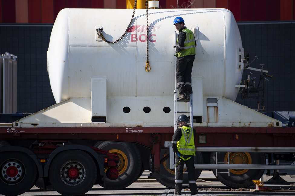 An oxygen cylinder is delivered to the Nightingale hospital at the Excel Centre in London