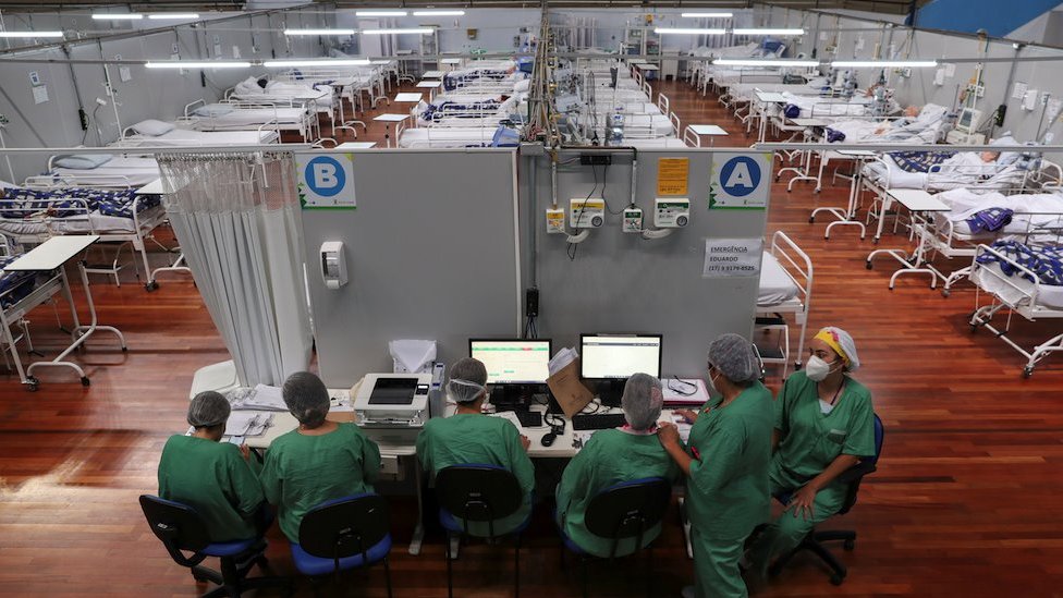Nurses work during New Year's Eve at a field hospital set up at a sports gym to treat patients suffering with the coronavirus disease (COVID-19) in Santo Andre, Sao Paulo state, Brazil, December 31, 2020.