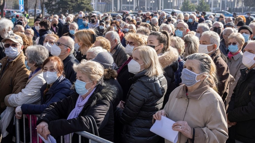 People wait to receive the Pfizer-BioNTech COVID-19 vaccine as the country begins mass vaccination for the coronavirus disease (COVID-19), in Belgrade, Serbia, February 3, 2021