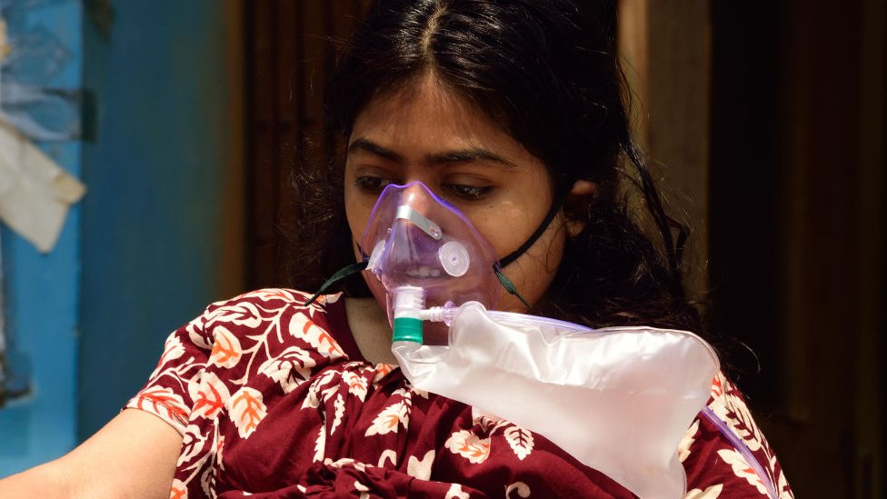 : Covid-19 patients wear medical oxygen masks outside a hospital before admission as pandemic situation has drastically deteriorated in the county in Kolkata, India on April 24, 2021.