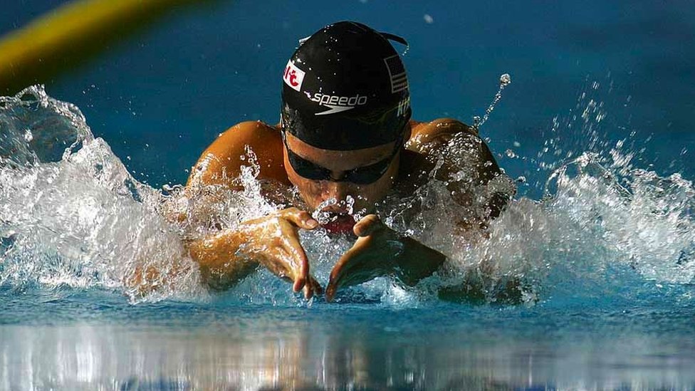 Dr Tara Kirk Sell swimming doing breaststroke