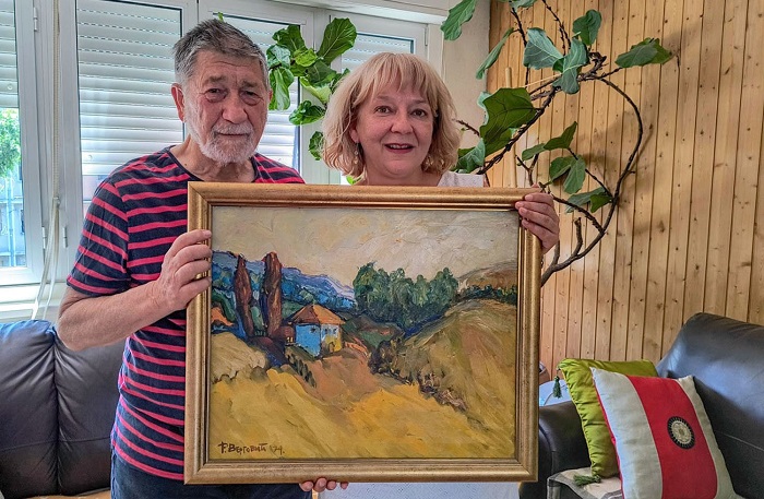 Miodrag R Jovanovic sa kustoskinjom Nardnog muzeja Uzice Foto Narodni muzej Uzice